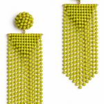 A pair of bright lime green beaded statement earrings with spherical studs and long cascading fringe, displayed on a clean white background.