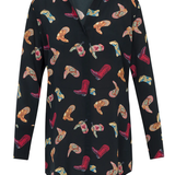 Black shirt with colorful cowboy boot pattern on a white background