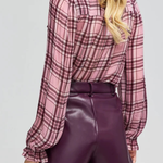 Women's plaid blouse featuring long sleeves, a relaxed silhouette, and multicolor pattern.