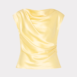Yellow satin top on a light gray background