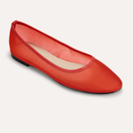 Red flat shoe on a white background
