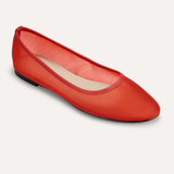 Red flat shoe on a white background