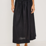 Person wearing a black skirt on a white background
