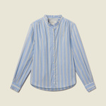 A light blue long-sleeve button-up shirt with vertical white stripes, featuring a high collar and buttoned front, laid flat against a solid beige background.