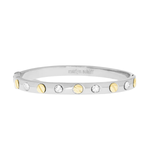 Silver bracelet with gold and white stones on a white background