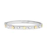 Silver bracelet with gold and white stones on a white background