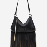 A black leather fringe shoulder bag with a single strap and silver-tone hardware, shown against a plain light gray background.