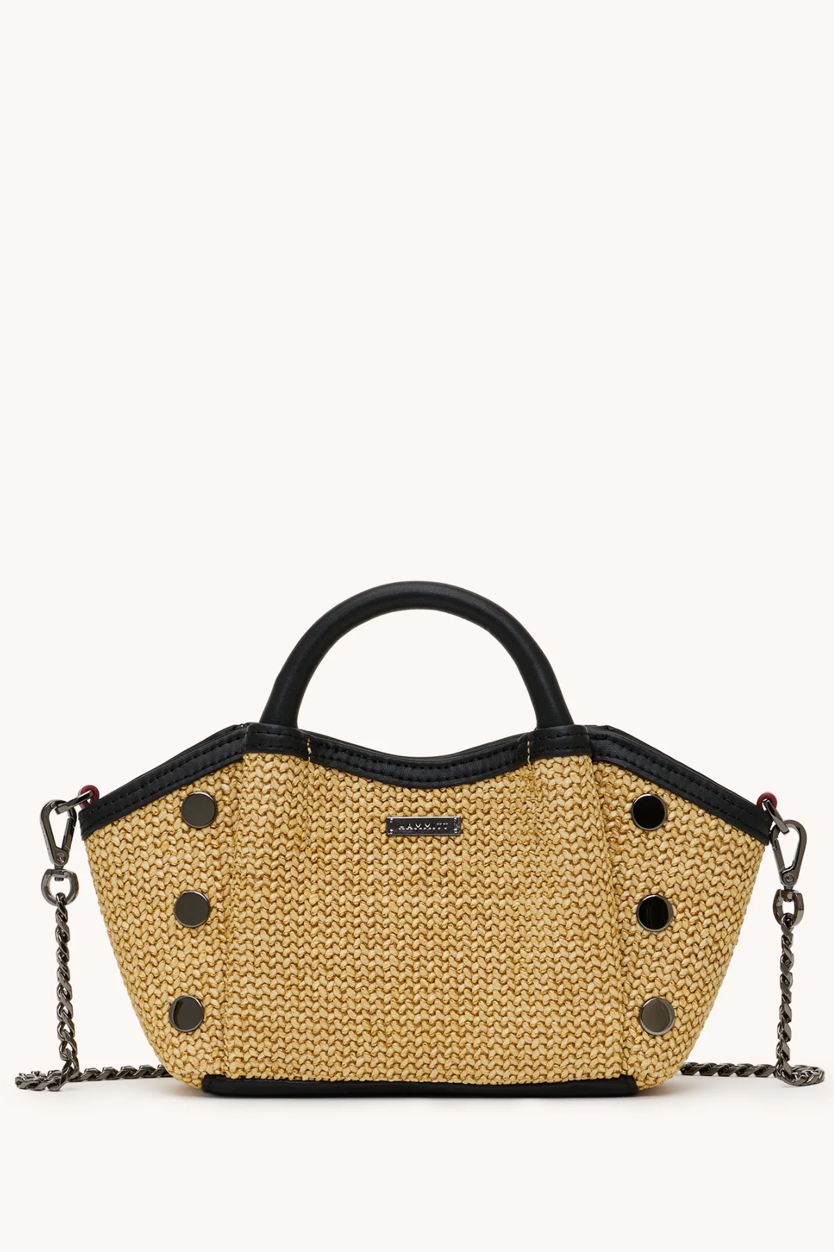 Woven handbag with black accents on a white background