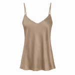 Beige slip dress on a white background