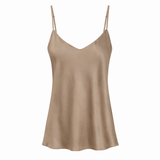 Beige slip dress on a white background