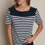 Striped short-sleeve tee with a relaxed fit, styled with denim