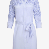 Light blue dress with floral lace details on a white background