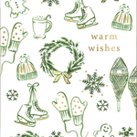 A white holiday greeting card with green line drawings of snowflakes, wreaths, ice skates, mittens, snow boots, gingerbread cookies, and pine branches, with the words 'warm wishes' in gold. A brown kraft envelope is partially visible underneath.