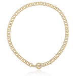 A gold chain necklace with a textured, openwork link design and a matching circular ring clasp, displayed on a clean white background with a soft reflection underneath.
